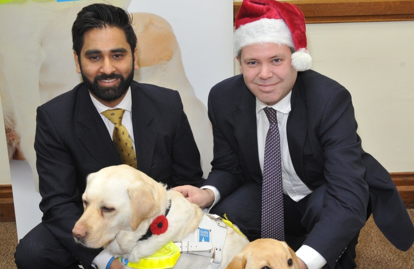 Edward meeting Guide Dogs supporters and the trainee guide dog pups